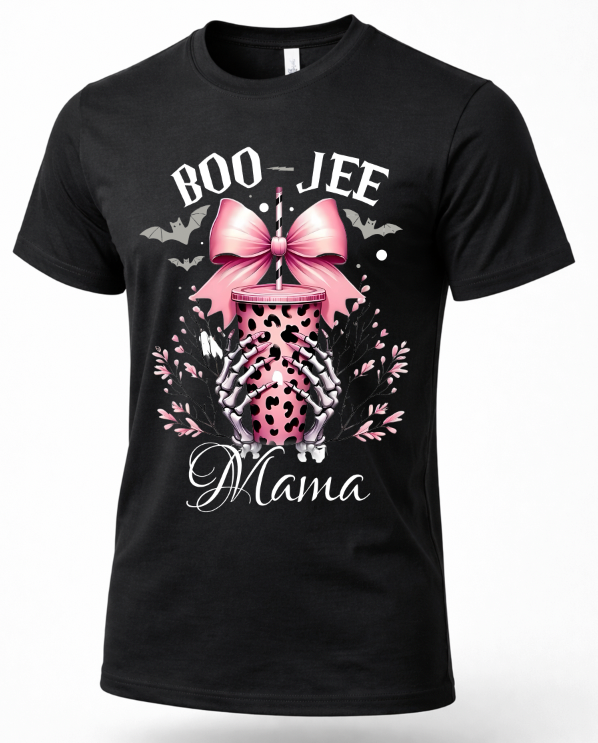 A black short-sleeve crewneck t-shirt featuring a Halloween-themed graphic on the front. The design includes the text 'BOO-JEE Mama' in white, a pink leopard-print coffee cup, a large pink bow, bats, and skeleton hands holding the cup.