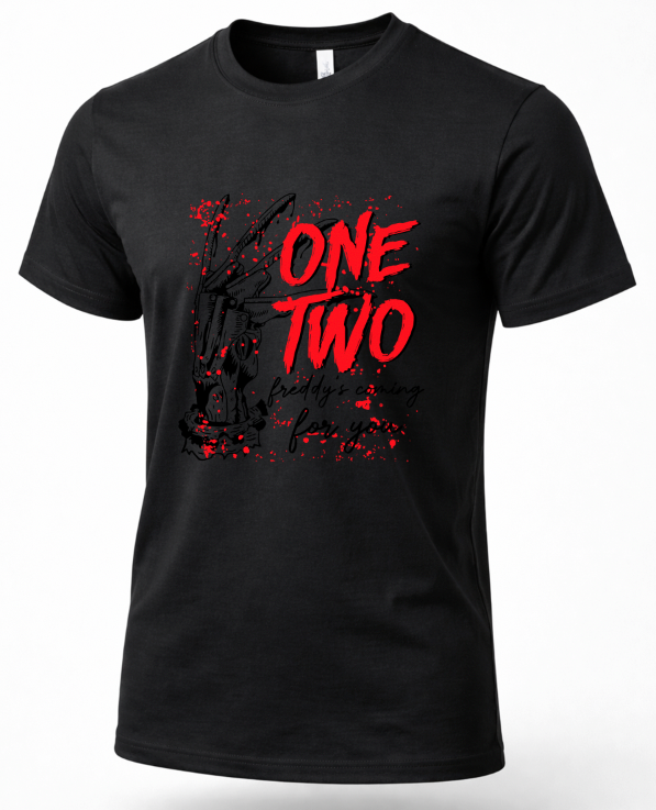 A black short-sleeve crewneck t-shirt featuring a graphic print on the front with the words 'ONE TWO' in distressed red lettering, a black silhouette of Freddy Krueger, and red blood splatter details, set against a plain white background.