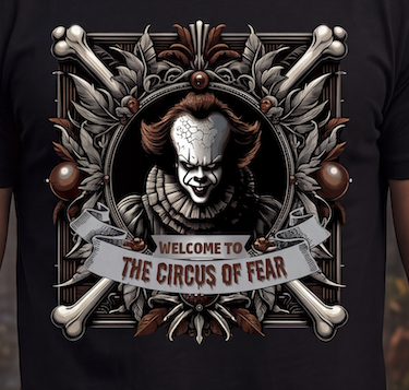 A close-up of a black t-shirt featuring a detailed graphic print of Pennywise the Clown from IT. The design includes a circular portrait of Pennywise, crossed bones, ornate scrollwork, and a banner reading 'WELCOME TO THE CIRCUS OF FEAR'.