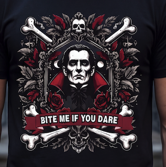 A close-up of a black t-shirt featuring a detailed graphic print of a vampire with red cape, surrounded by bones, skulls, roses, and a red banner that reads 'BITE ME IF YOU DARE'.