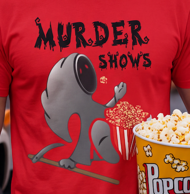A close-up of a red t-shirt featuring a cartoon graphic of a gray creature eating popcorn next to a bucket of popcorn, with the text 'MURDER SHOWS' above it. A person's arms are visible at the sides.