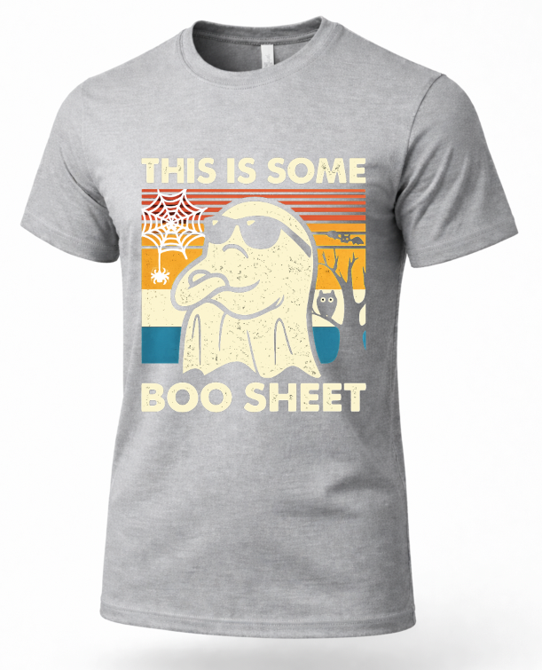 A heather gray short-sleeve t-shirt with a retro-style graphic of a ghostly Darth Vader wearing sunglasses, with the text 'THIS IS SOME BOO SHEET' in cream lettering.