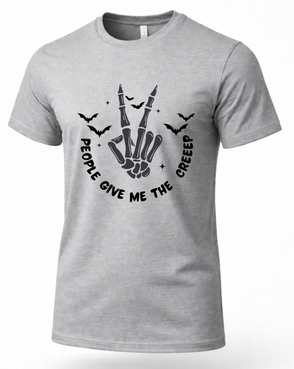 A light heather gray short-sleeve crewneck t-shirt featuring a black graphic of a skeleton hand making the peace sign, surrounded by bats and the text 'PEOPLE GIVE ME THE GREEEP'.