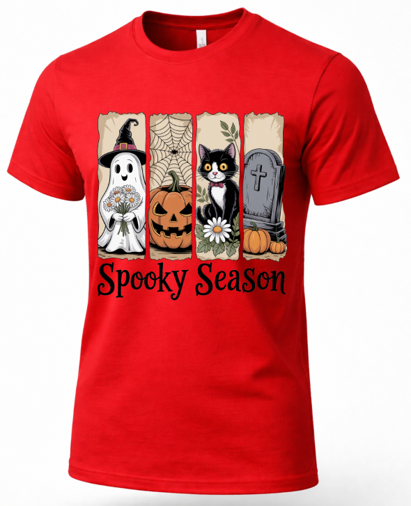 A red short-sleeve crewneck t-shirt featuring a 'Spooky Season' graphic print on the front. The graphic displays four vertical panels with Halloween illustrations: a ghost in a witch hat holding flowers, a carved jack-o'-lantern, a black-and-white cat with a daisy, and a gray tombstone with pumpkins.