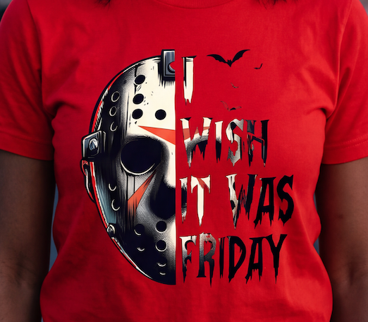 A red short-sleeve t-shirt featuring a horror-themed graphic print of a split hockey mask and the text 'I WISH IT WAS FRIDAY' in dripping black letters, worn by a person.