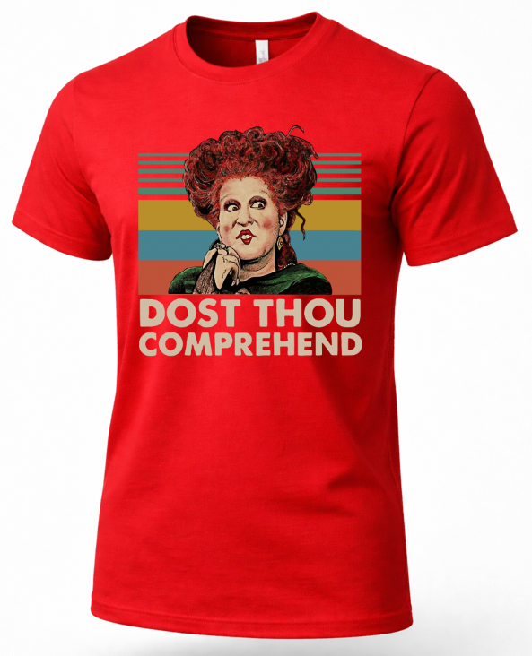 A red short-sleeve t-shirt featuring a retro-style graphic of the character Hallowell from The Three Brides with red hair, set against a striped background with the text 'DUST THOU COMPREHEND'.