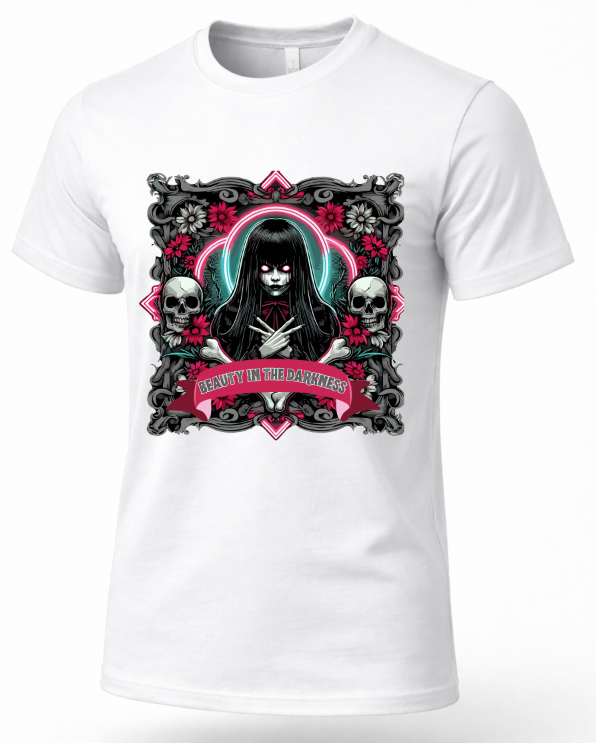 A white short-sleeve crewneck t-shirt featuring a gothic-style graphic print of a girl with long black hair, a glowing pink and teal halo, skulls, roses, and a banner that reads 'BEAUTY IN DARKNESS'.