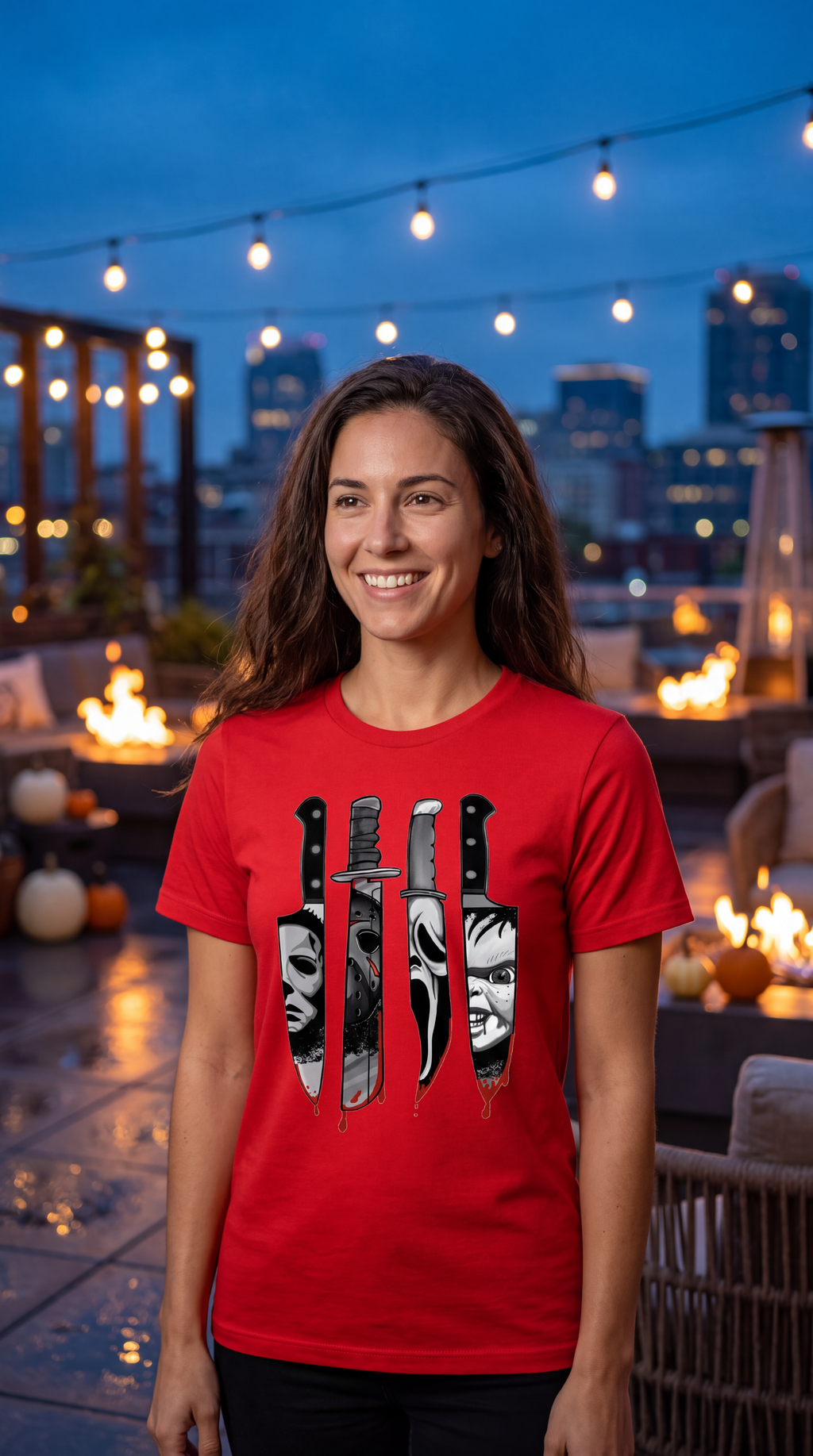 A woman stands in an apple orchard wearing a red graphic T-shirt with a vintage-style portrait and the text 'DOST THOU COMPREHEND.' The background shows trees with autumn foliage and baskets of apples.