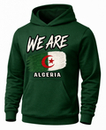 A dark green pullover hoodie featuring a distressed graphic of the Algeria flag with the text 'WE ARE' above and 'ALGERIA' below, shown on a plain white background.