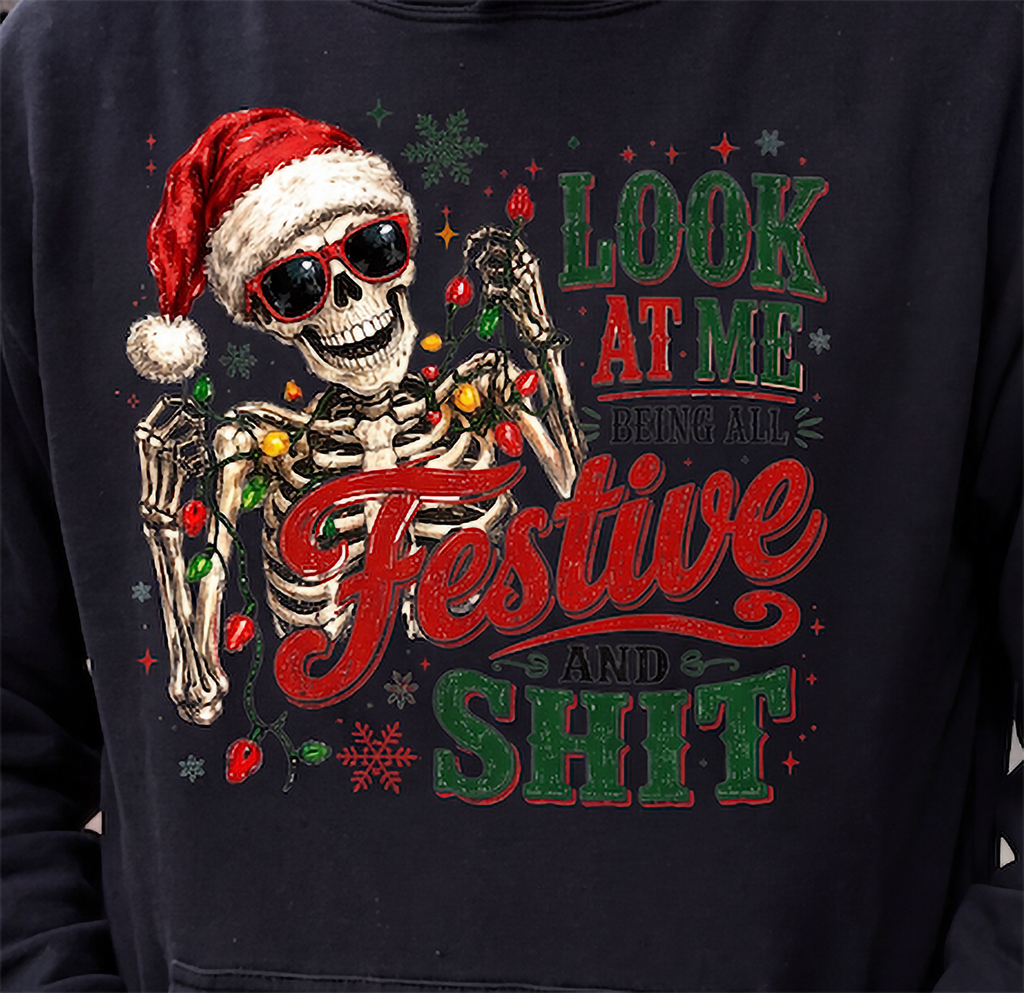 Close-up of black All Festive and Shit skeleton Christmas hoodie design