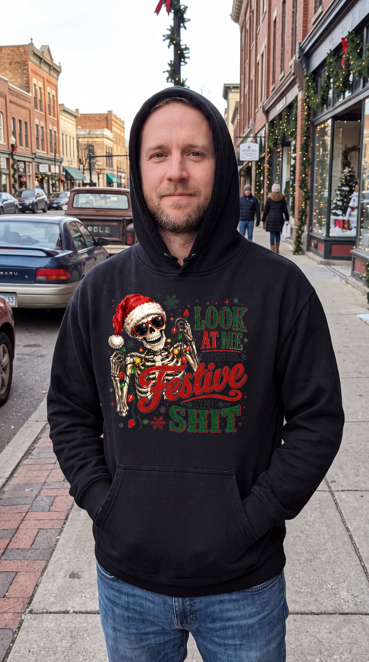 Man wearing black funny Christmas skeleton hoodie with All Festive and Shit design