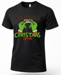 Black unisex Christmas t-shirt featuring green hands rolling a festive joint with red and green Rolling Up Some Christmas Spirit lettering.