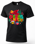 Black Mockup: Black unisex Christmas Vibes graphic t-shirt featuring colorful holiday lettering, lightning bolt, Christmas tree, candy canes, and festive decorations.