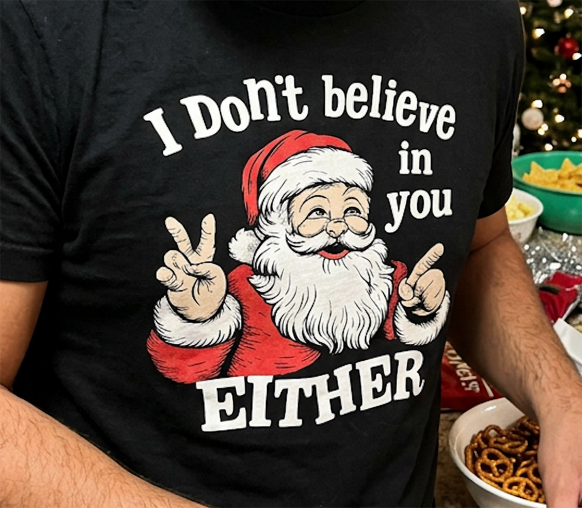 Close-up of black funny Santa Christmas shirt showing vintage Santa artwork and bold white sarcastic holiday saying.