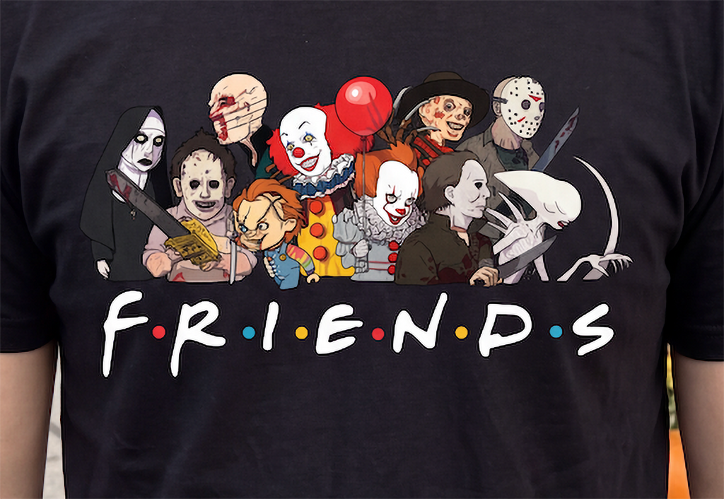 Close-up of black Horror Friends shirt featuring classic horror movie characters