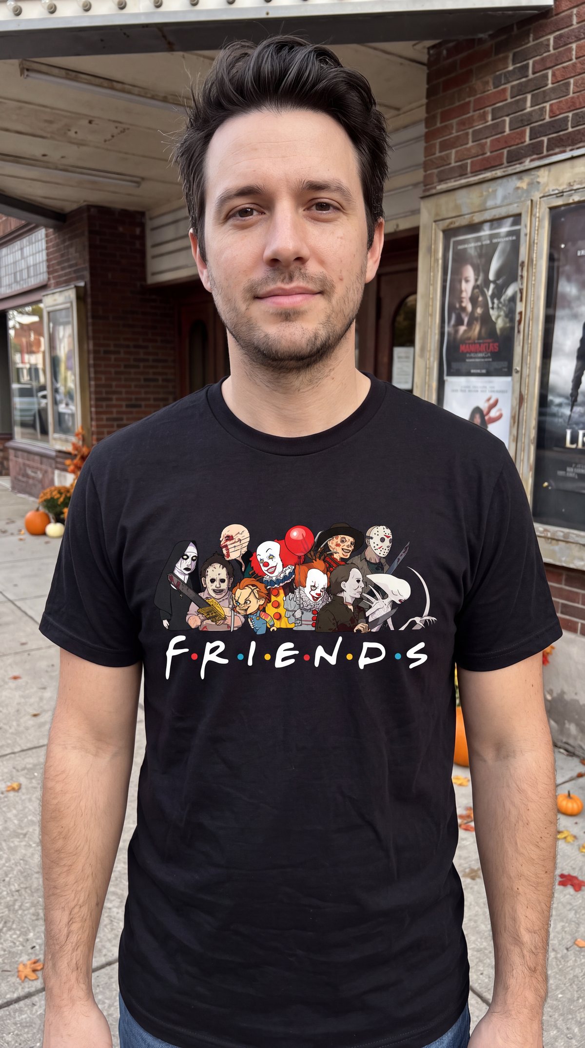 Man wearing black Horror Friends shirt with classic scary movie characters