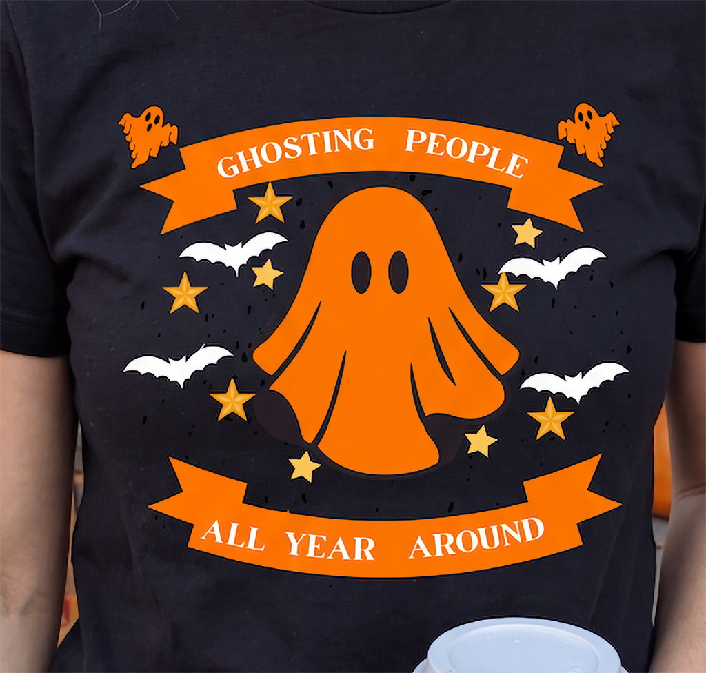 Close-up of black Ghosting People Halloween shirt with orange ghost and bats design