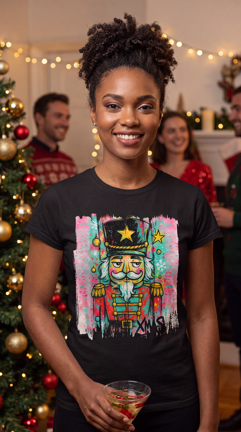 Woman wearing black colorful graffiti nutcracker Christmas shirt in festive holiday setting