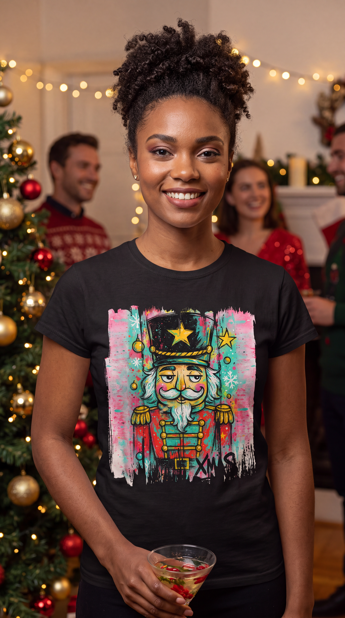 Woman wearing black colorful graffiti nutcracker Christmas shirt in festive holiday setting