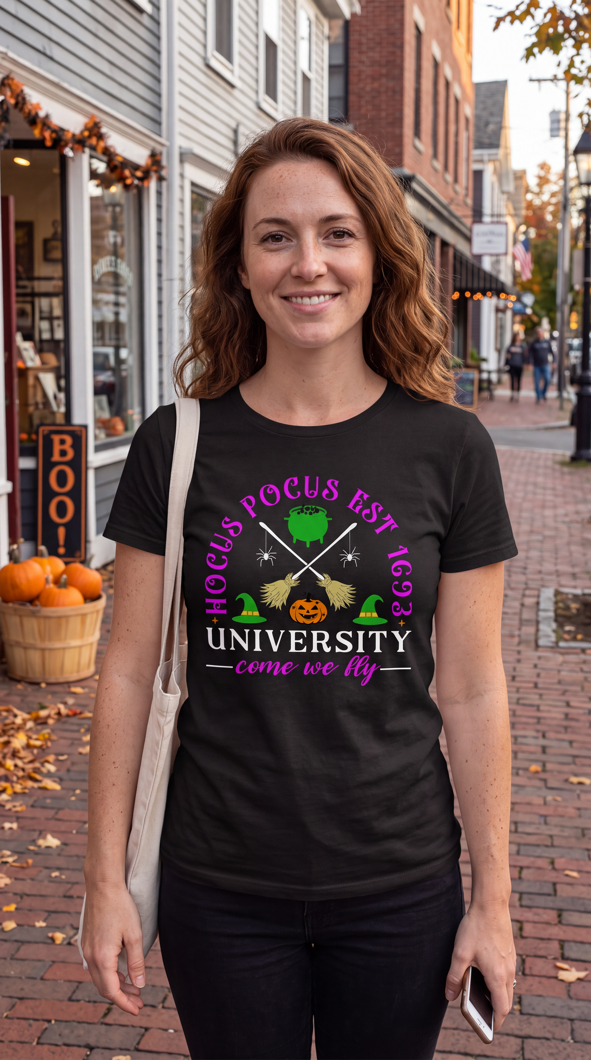 Woman wearing black Hocus Pocus University Come We Fly Halloween shirt