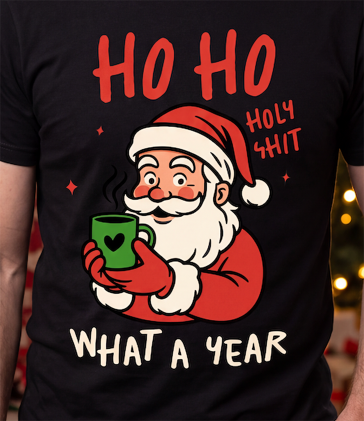 Close-up of Ho Ho Holy Shit Christmas graphic on black shirt featuring funny Santa and What a Year saying.
