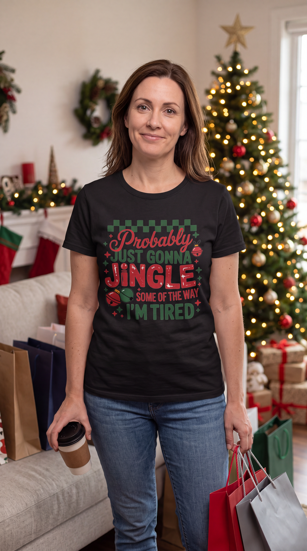 Woman wearing a black Probably Just Gonna Jingle Some of the Way Christmas shirt in a festive holiday setting.