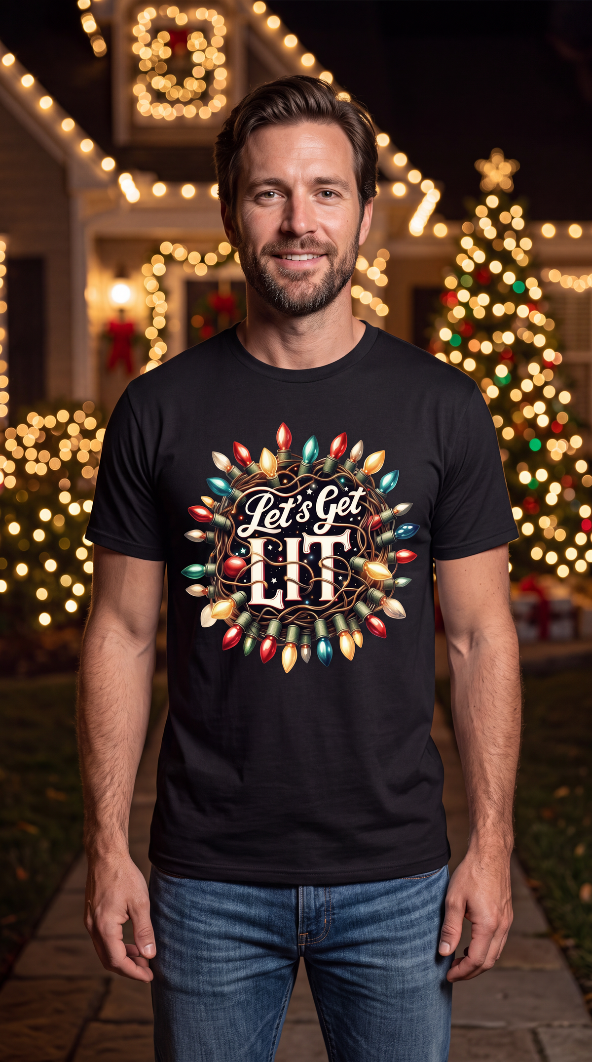 Man wearing black Let’s Get Lit Christmas graphic tee with colorful Christmas lights design.