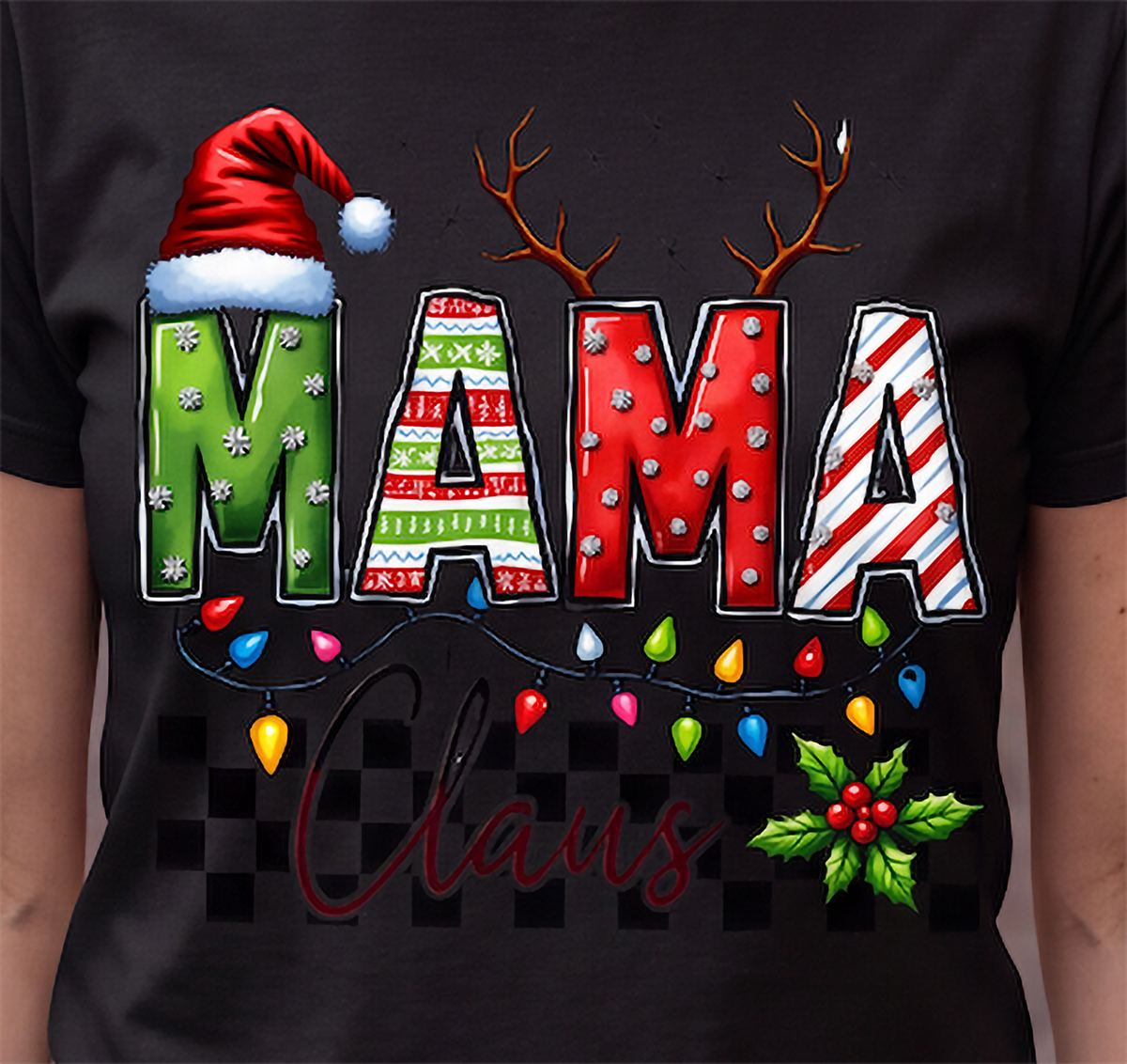 Close-up of black Mama Claus Christmas shirt with Santa hat, reindeer antlers, Christmas lights and checkered accents.