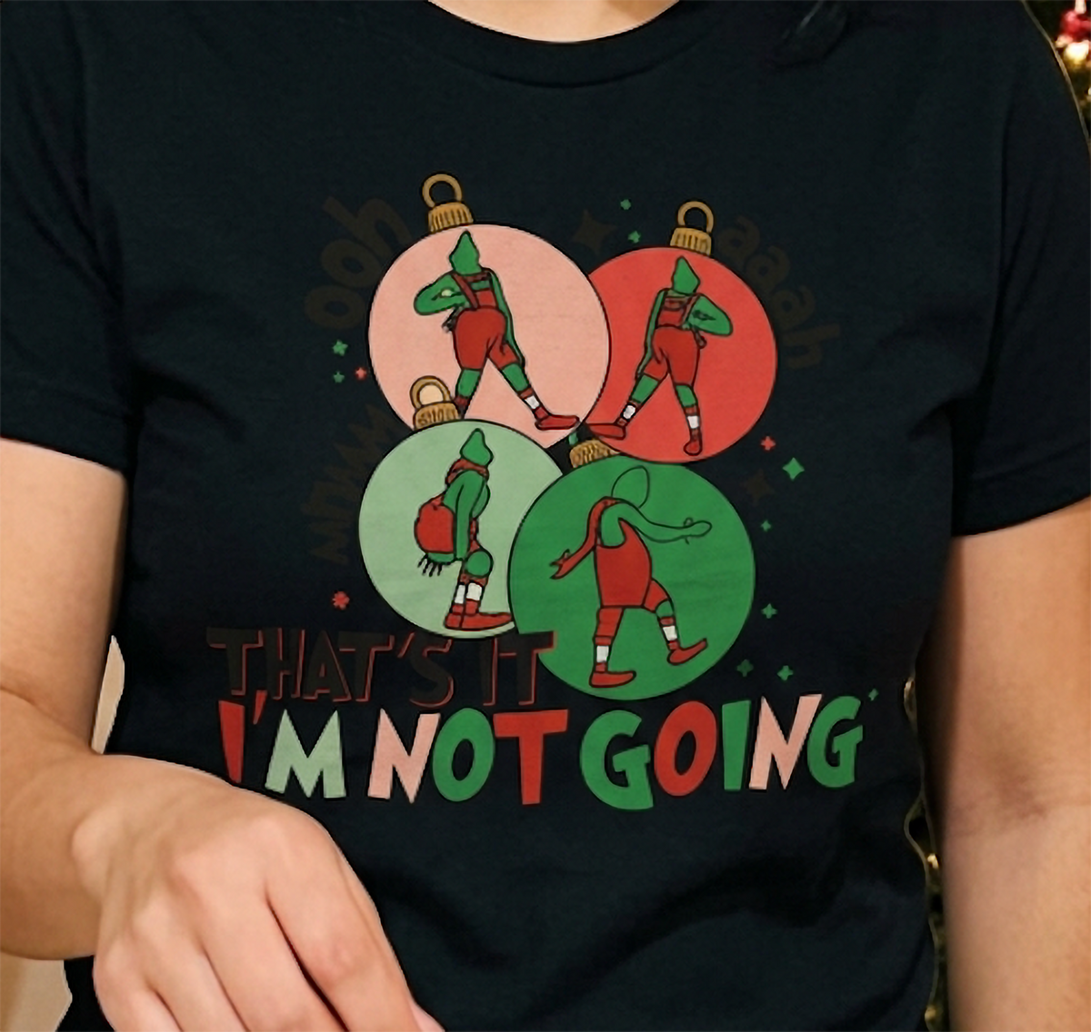 Black Close-Up: Detailed close-up of the sarcastic That's It I'm Not Going Christmas design printed on a black t-shirt.