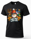Black unisex Christmas t-shirt featuring They Not Like Us graphic with Santa, reindeer, snowman, and gingerbread characters wearing sunglasses.