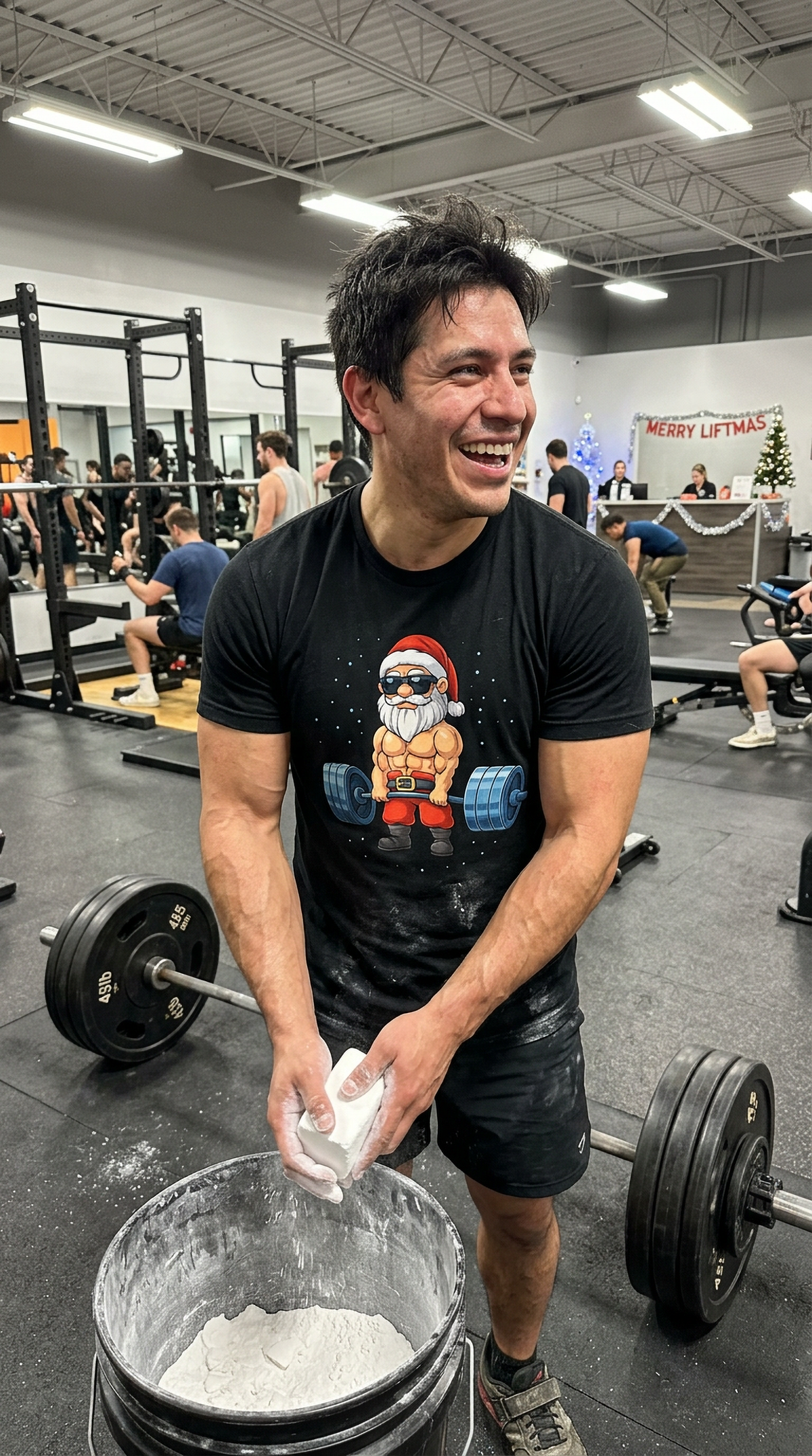 Man wearing a black Swole Santa Christmas gym t-shirt while working out, featuring a muscular Santa Claus lifting a barbell.