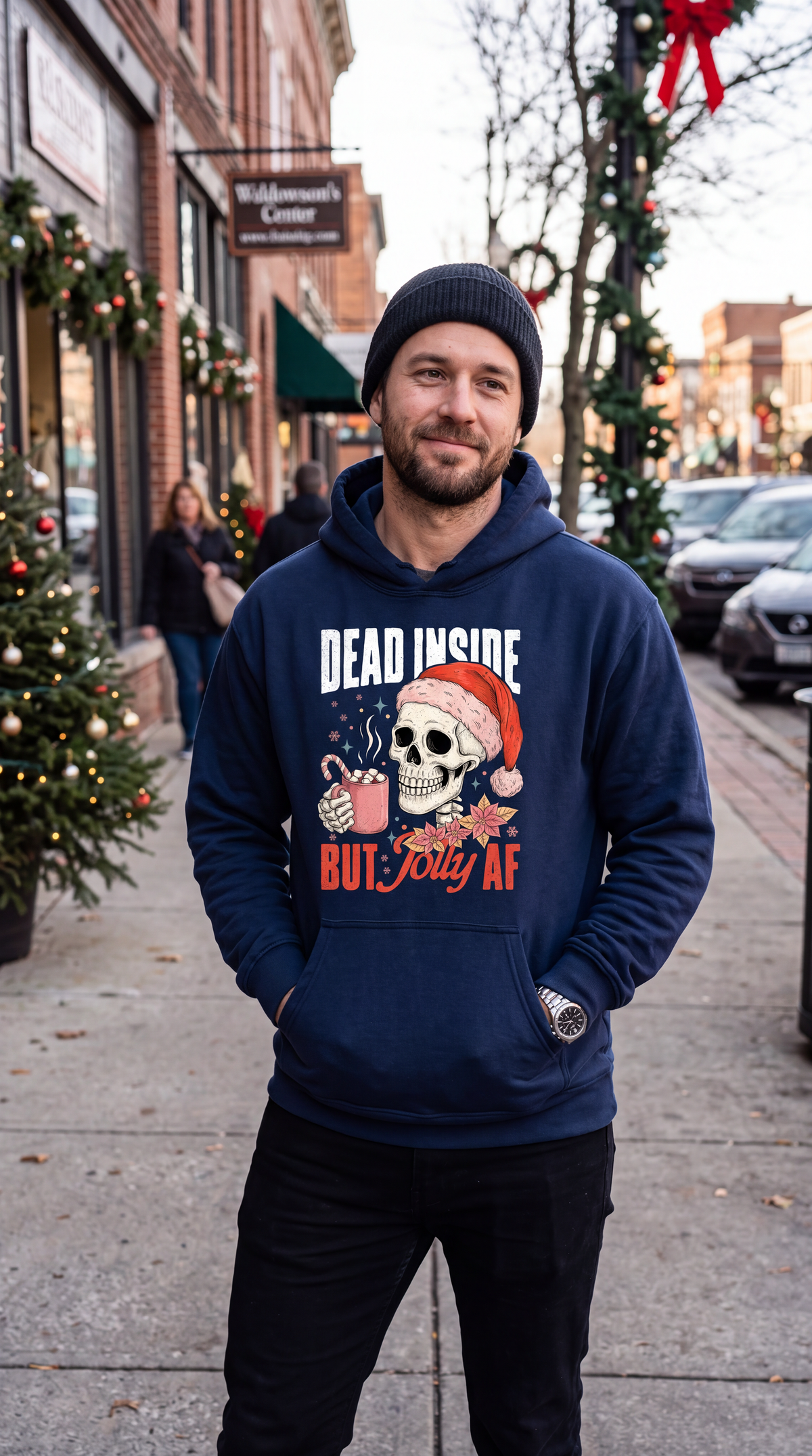 Man outdoors wearing black funny Christmas skeleton hoodie