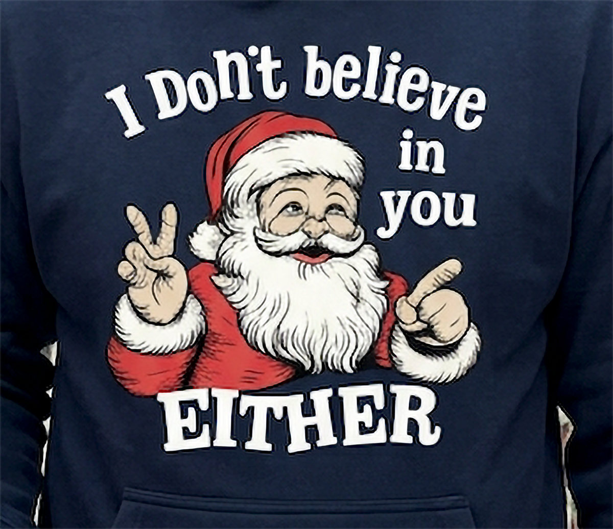 Close-up of I Don’t Believe in You Either Santa graphic on navy blue hoodie