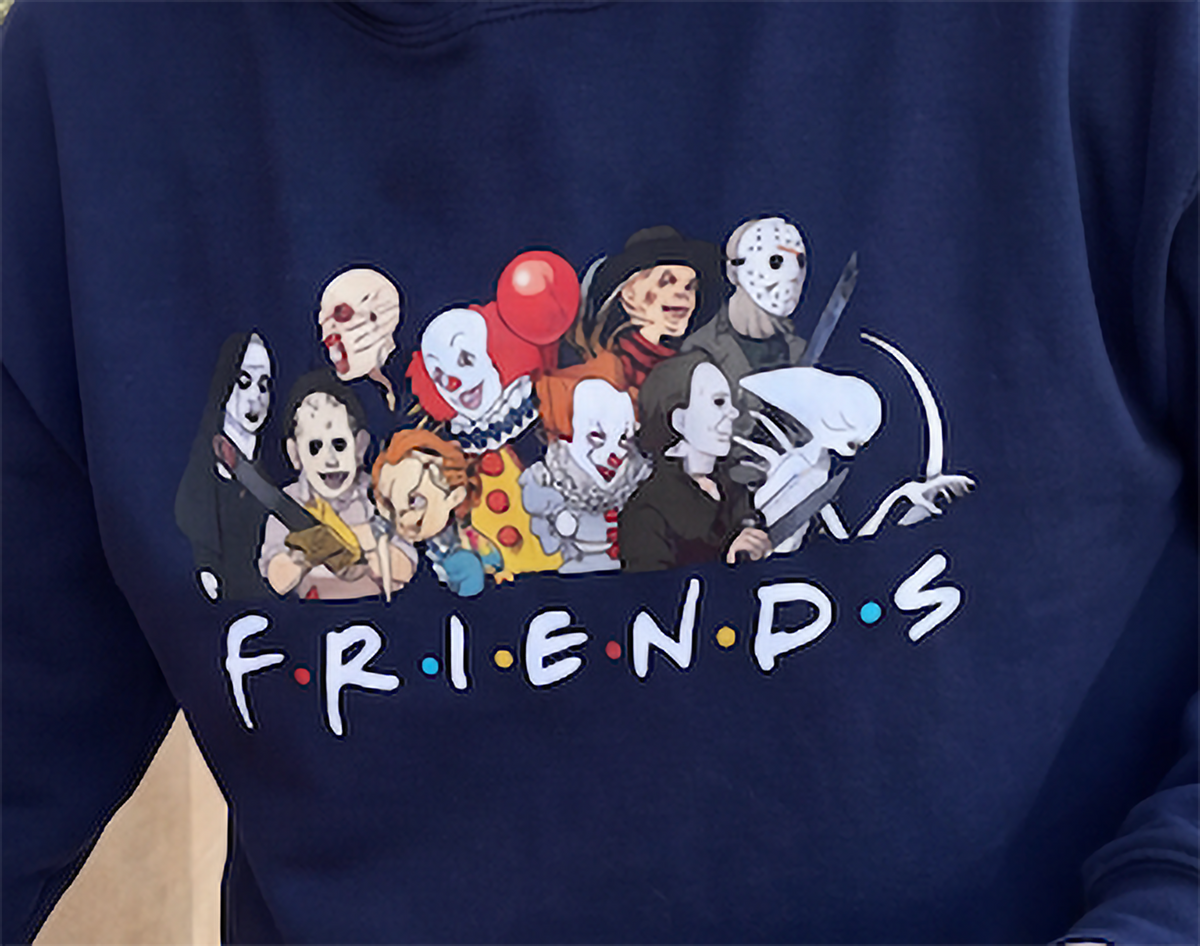Close-up of navy Horror Friends hoodie featuring classic horror characters