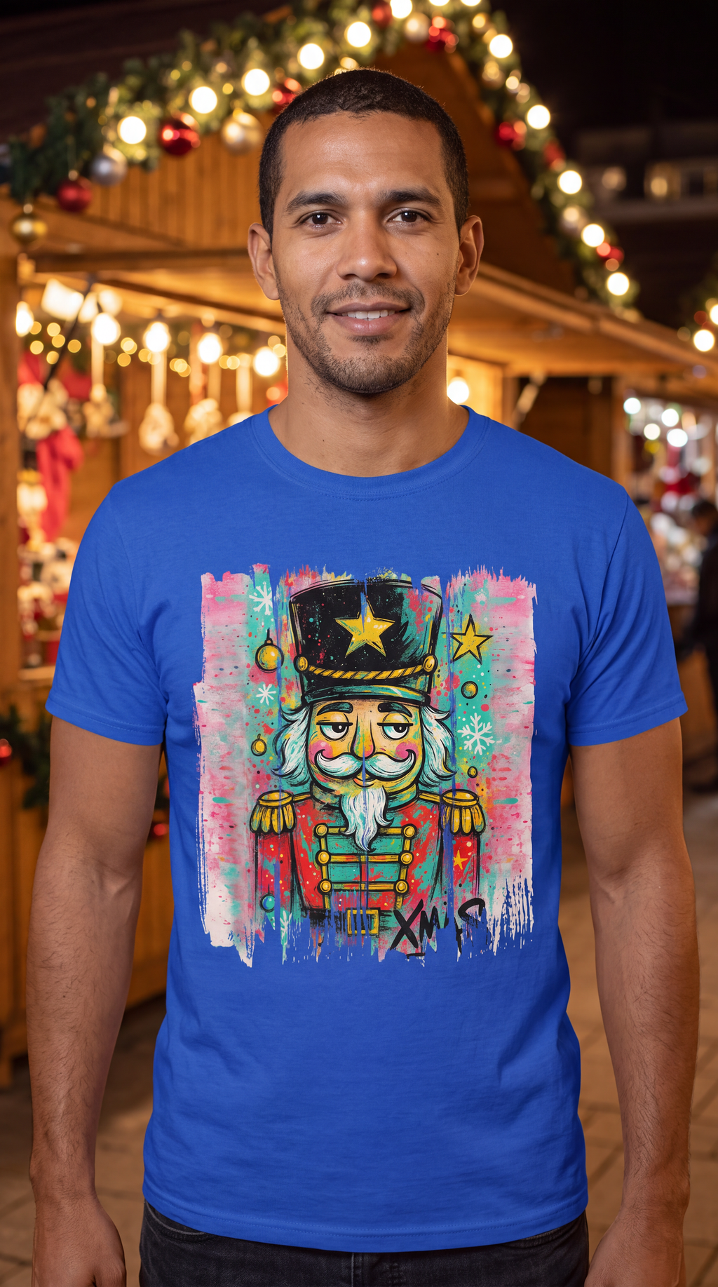 Man wearing blue colorful graffiti nutcracker Christmas graphic tee