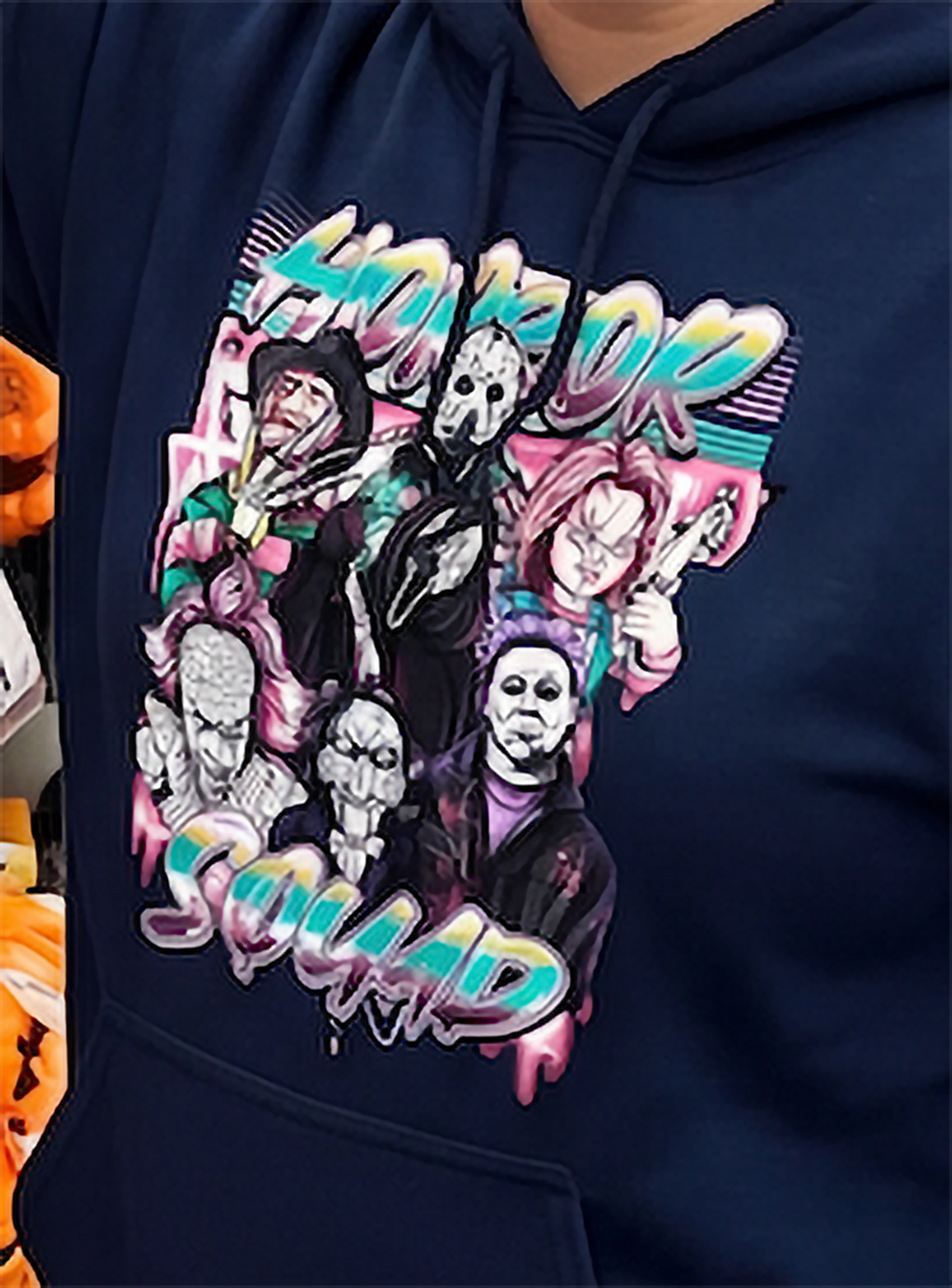Close-up of navy Horror Squad hoodie featuring classic scary movie characters
