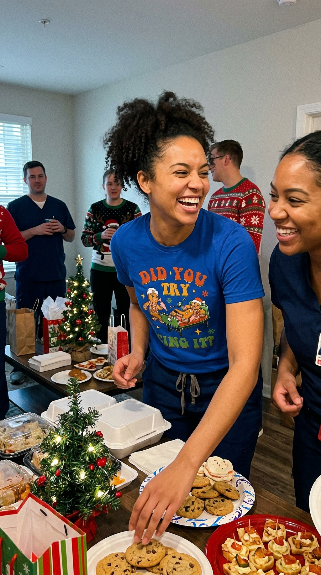 Person wearing a blue Did You Try Icing It Christmas shirt featuring funny gingerbread healthcare humor.