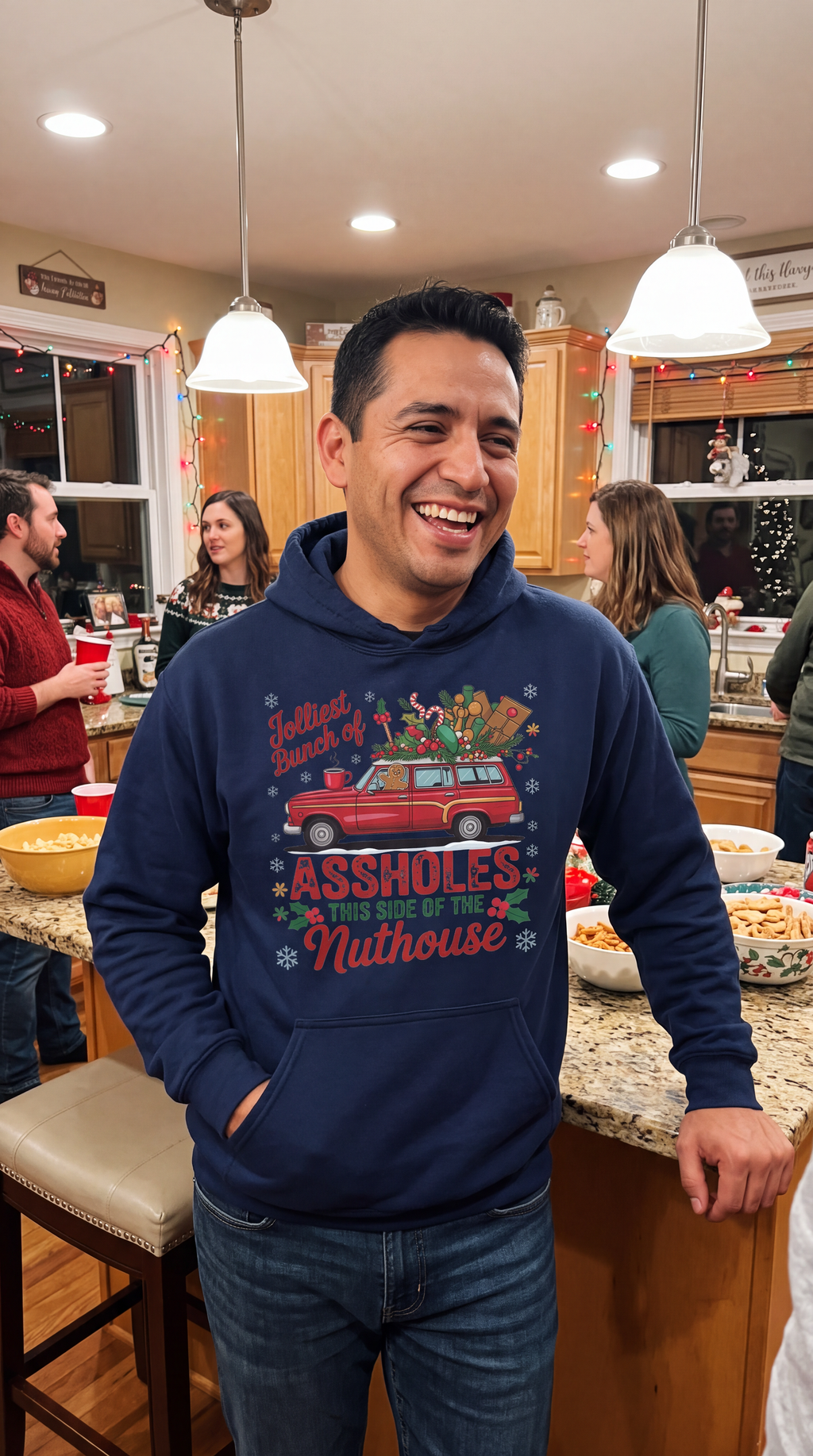 Man wearing navy blue funny family Christmas hoodie with Jolliest Bunch design