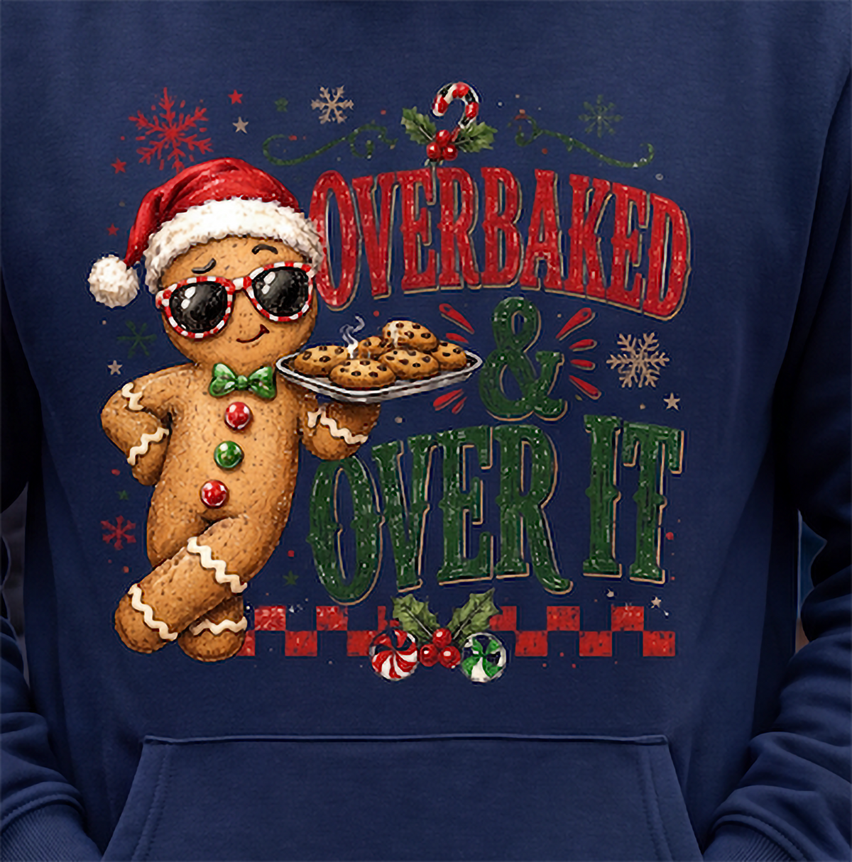 Close-up of navy blue funny gingerbread Christmas hoodie with festive cookie design