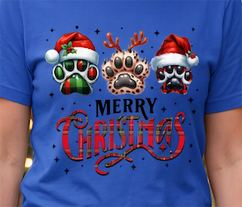 Close-up of blue Merry Christmas dog paw print shirt with Santa hats, reindeer antlers and plaid details.