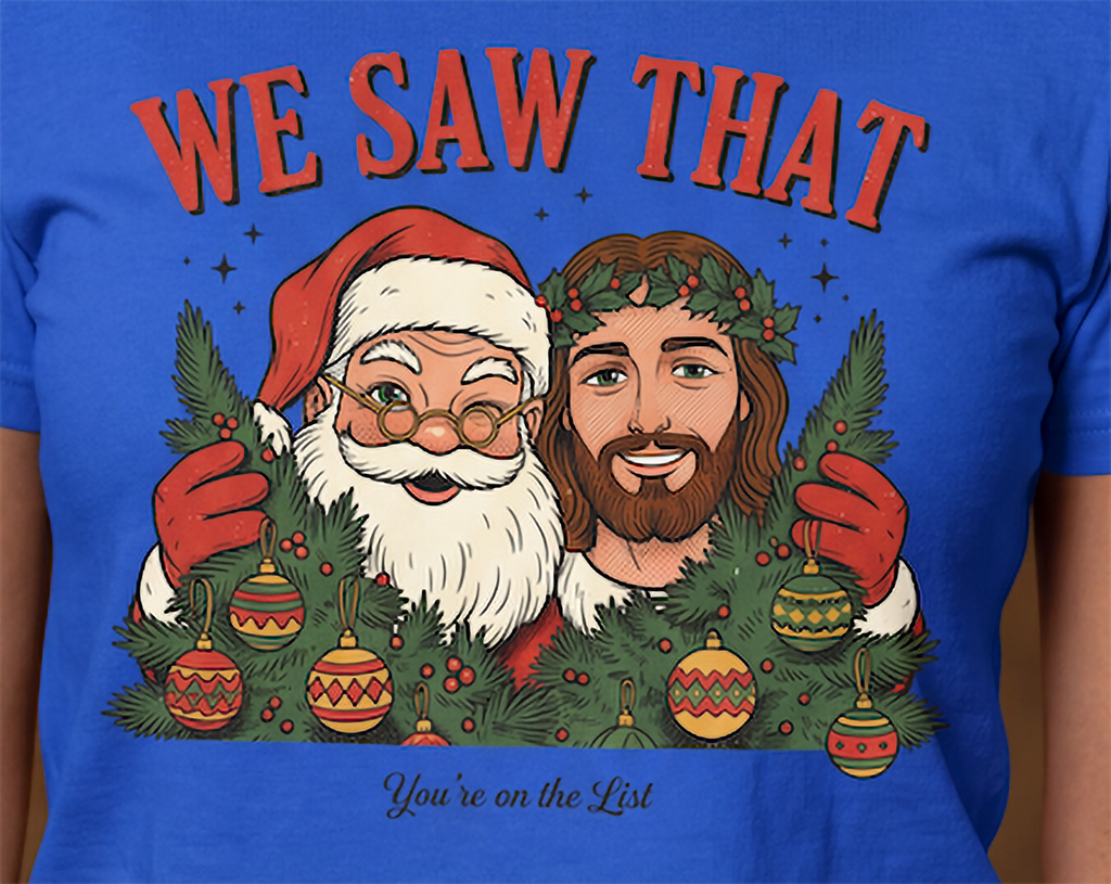 Close-up of We Saw That Santa and Jesus Christmas artwork on blue shirt