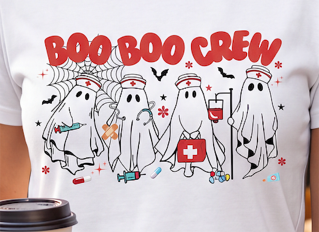 Close-up of Boo Boo Crew Halloween nurse design with four ghost nurses, medical accessories, bats and spiderweb details.