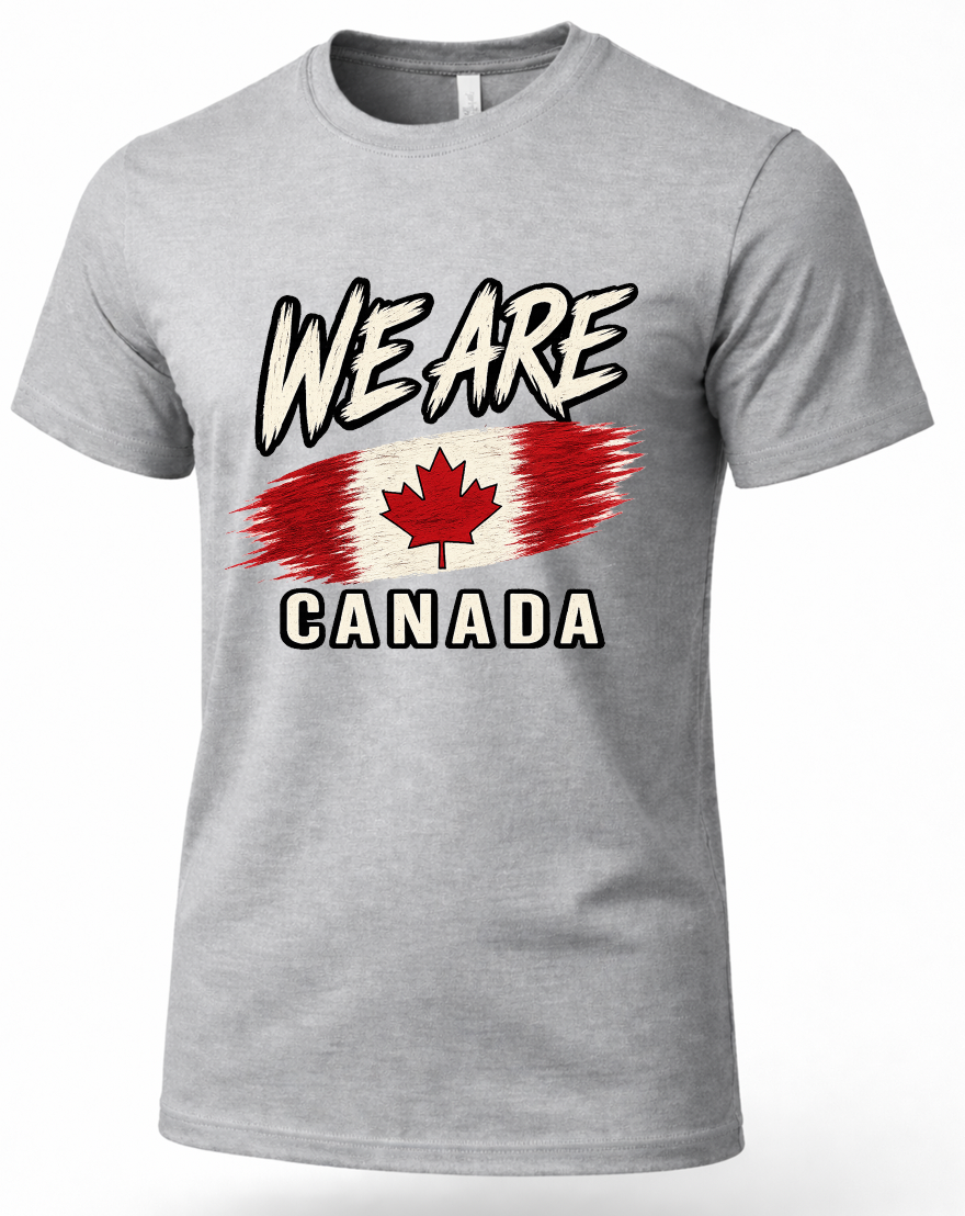 A heather gray short-sleeve t-shirt with a graphic print on the front that reads 'WE ARE' above a stylized Canadian flag and 'CANADA' below, shown on a plain white background.