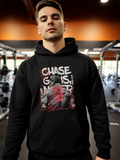 Man wearing black gym hoodie with ‘Chase Gains Never Stop’ graphic in weightlifting gym