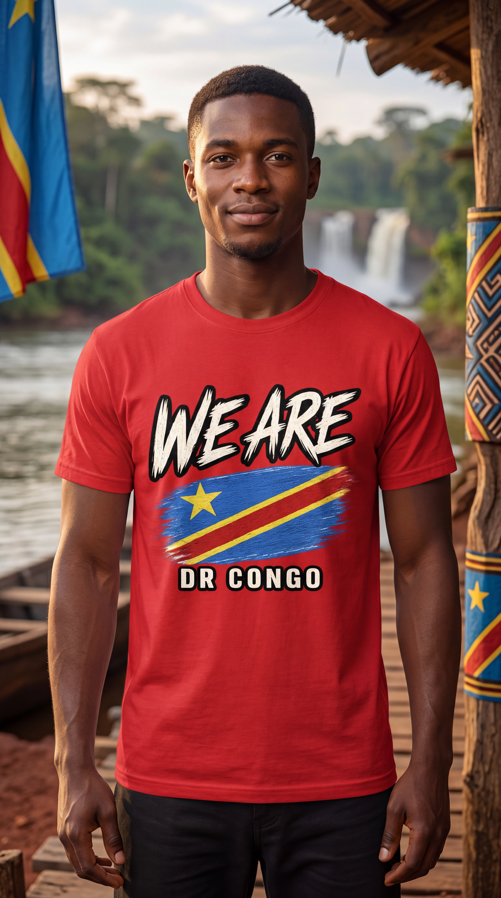 A man wearing a red graphic t-shirt with 'WE ARE DR CONGO' and the Congo flag design, standing on a wooden dock with a waterfall and forest in the background.