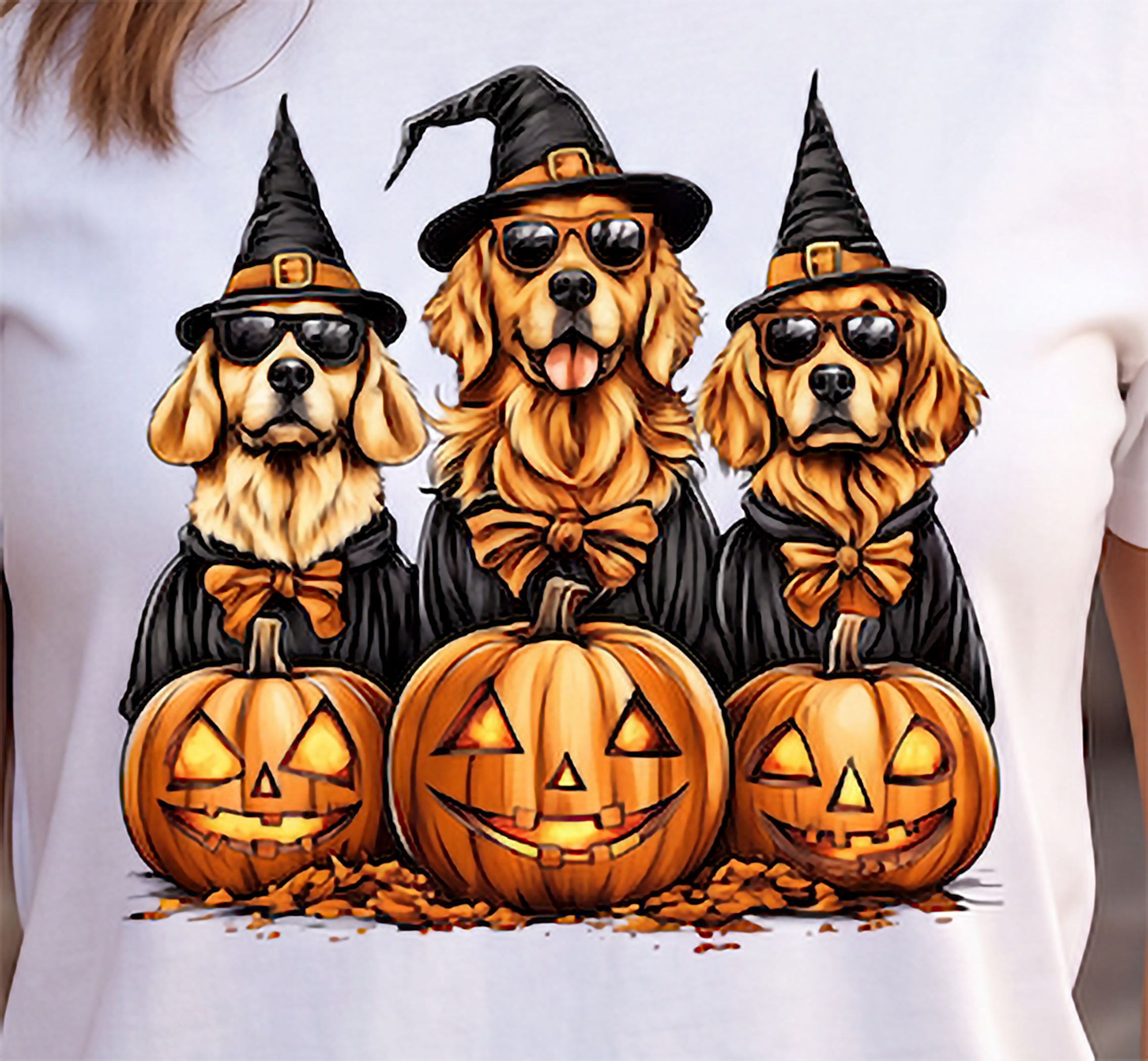 Close-up of Golden Retriever Halloween graphic featuring three costumed dogs with witch hats, sunglasses and jack-o-lanterns