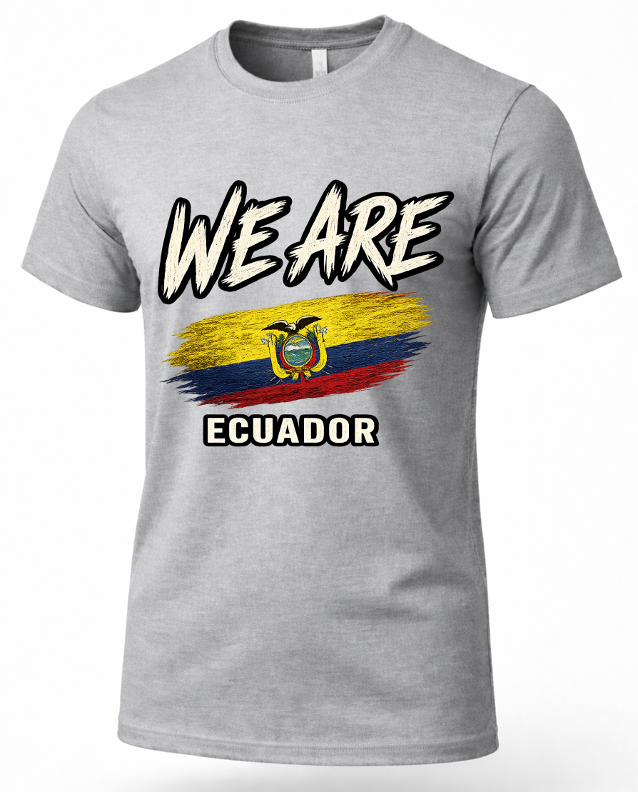 A heather gray short-sleeve crewneck t-shirt featuring a graphic print of the Ecuador flag with the text 'WE ARE' above and 'ECUADOR' below in a bold, white-outlined font.