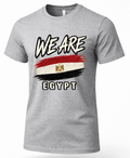 A heather gray short-sleeve t-shirt with a graphic print featuring the text 'WE ARE' above a stylized Egyptian flag and 'EGYPT' below, shown on a plain white background.