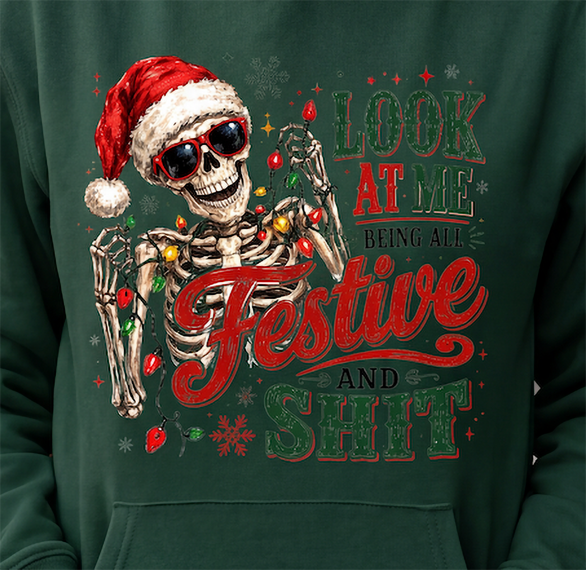 Close-up of forest green All Festive and Shit Christmas hoodie design