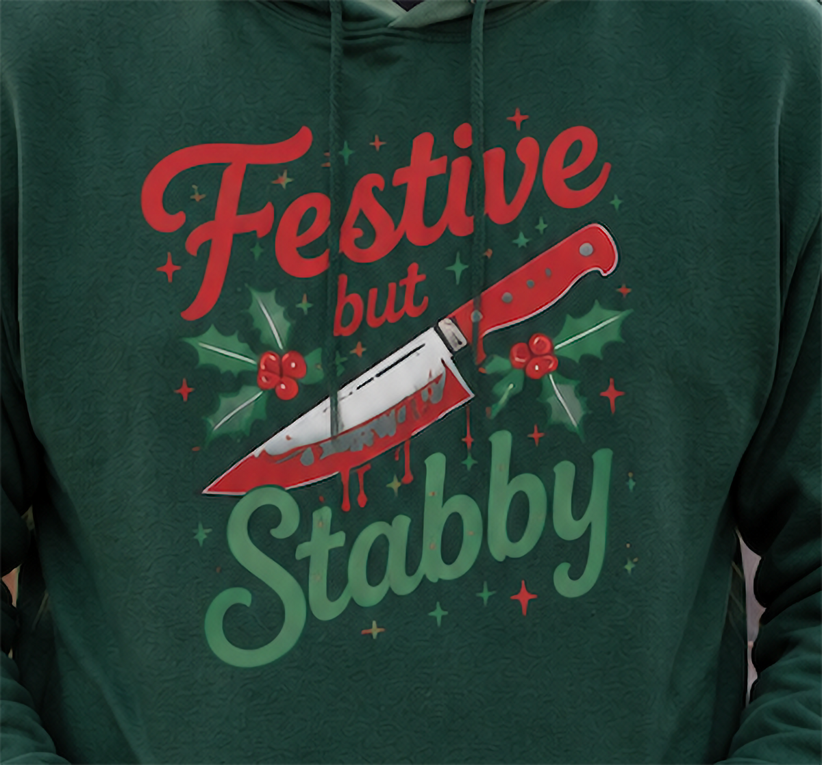 Close-up of forest green sarcastic Christmas hoodie with Festive But Stabby design